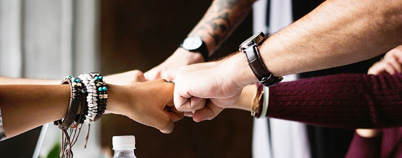 post-headers_team_fist_bump_loyalty