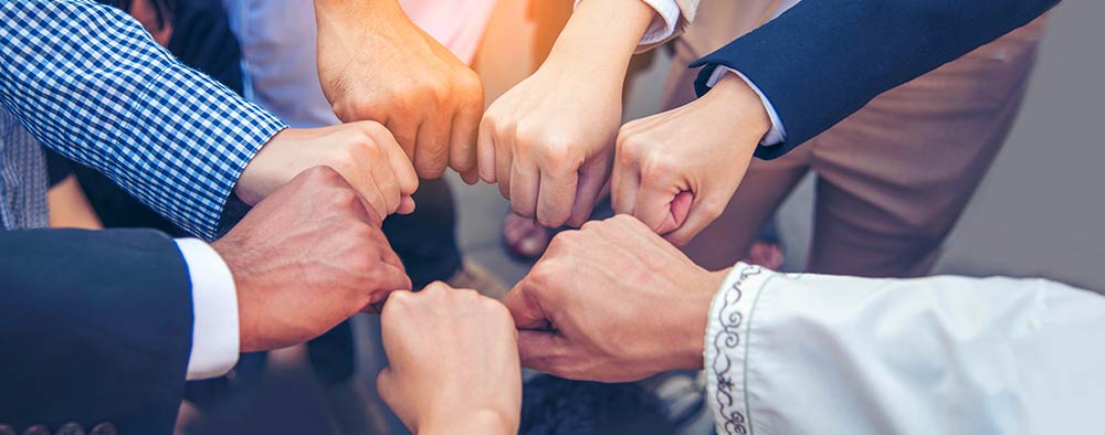 post-headers_empower_fist_bump